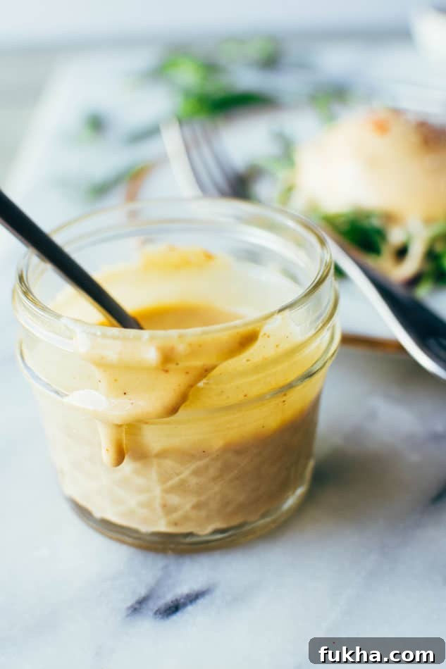 Easy dairy free tahini hollandaise sauce! So simple to make (in a blender!) and still full of healthy fats and delicious flavor for your endless list of things that you have just been waiting to drown in hollandaise goodness.