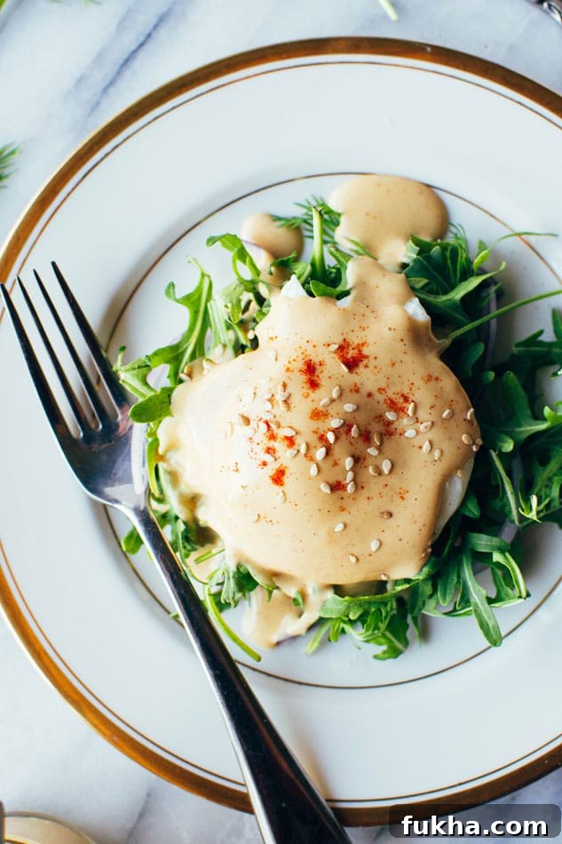 Easy dairy free tahini hollandaise sauce! So simple to make (in a blender!) and still full of healthy fats and delicious flavor for your endless list of things that you have just been waiting to drown in hollandaise goodness.