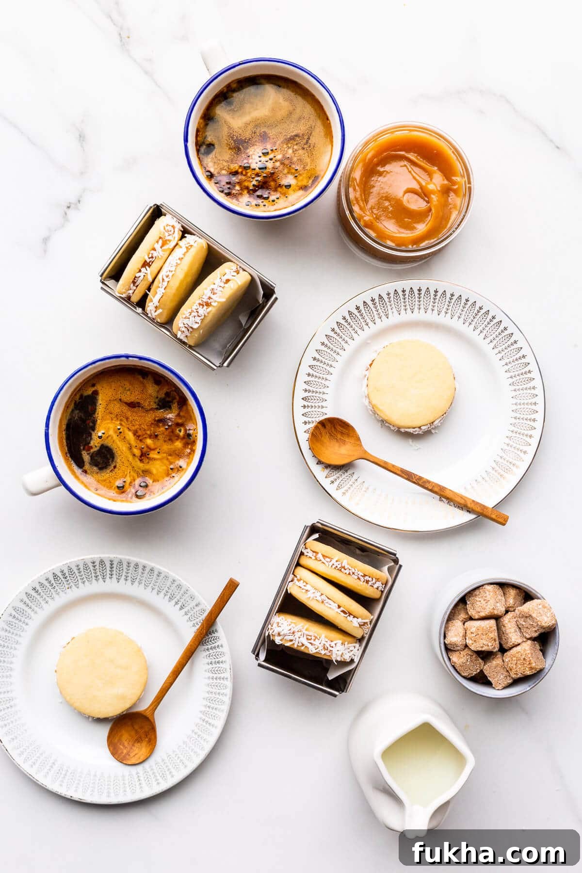 Classic Argentinian Alfajores Recipe with Dulce de Leche 11 Homemade alfajores cookies on plates served with coffee.