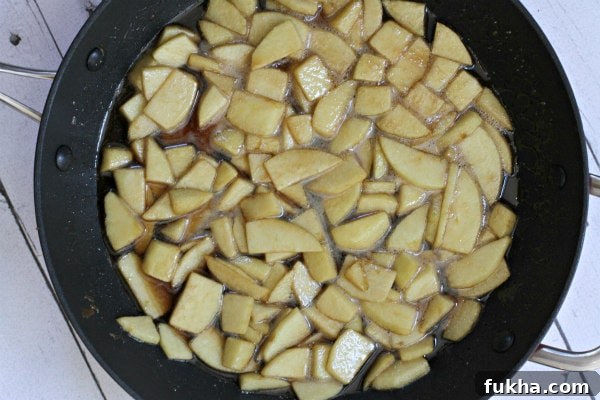 Apples sautéing in pan