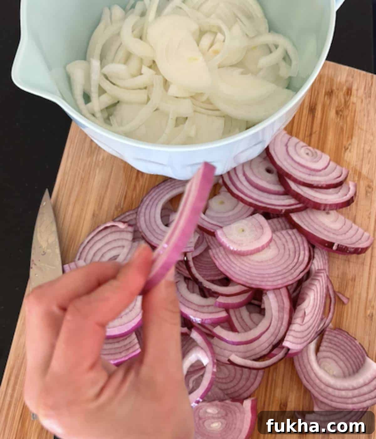Red and yellow onions sliced.