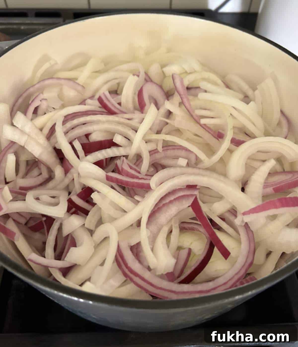Sliced onions in dutch oven.