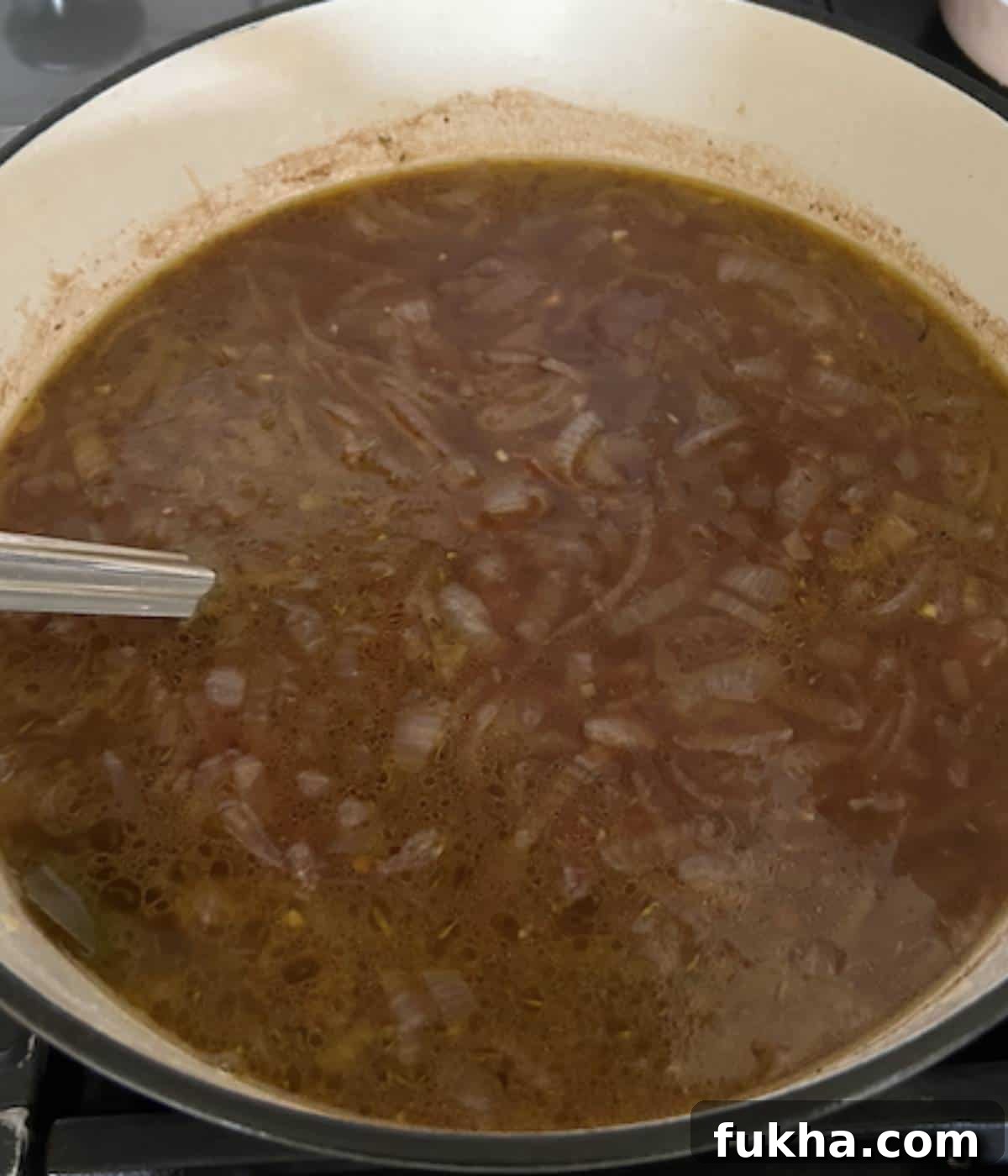 French onion soup in dutch oven.