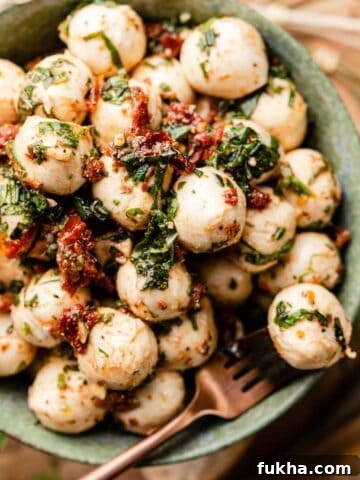 marinated mozzarella balls in bowl.
