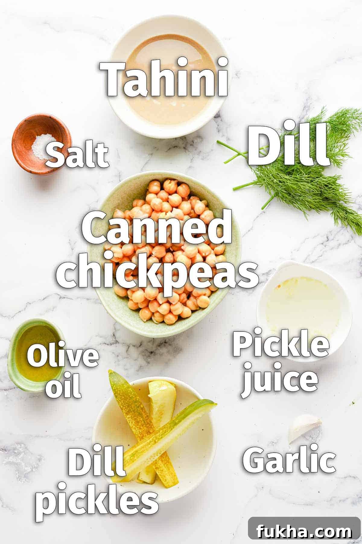 recipe ingredients for dill pickle hummus with text labels.