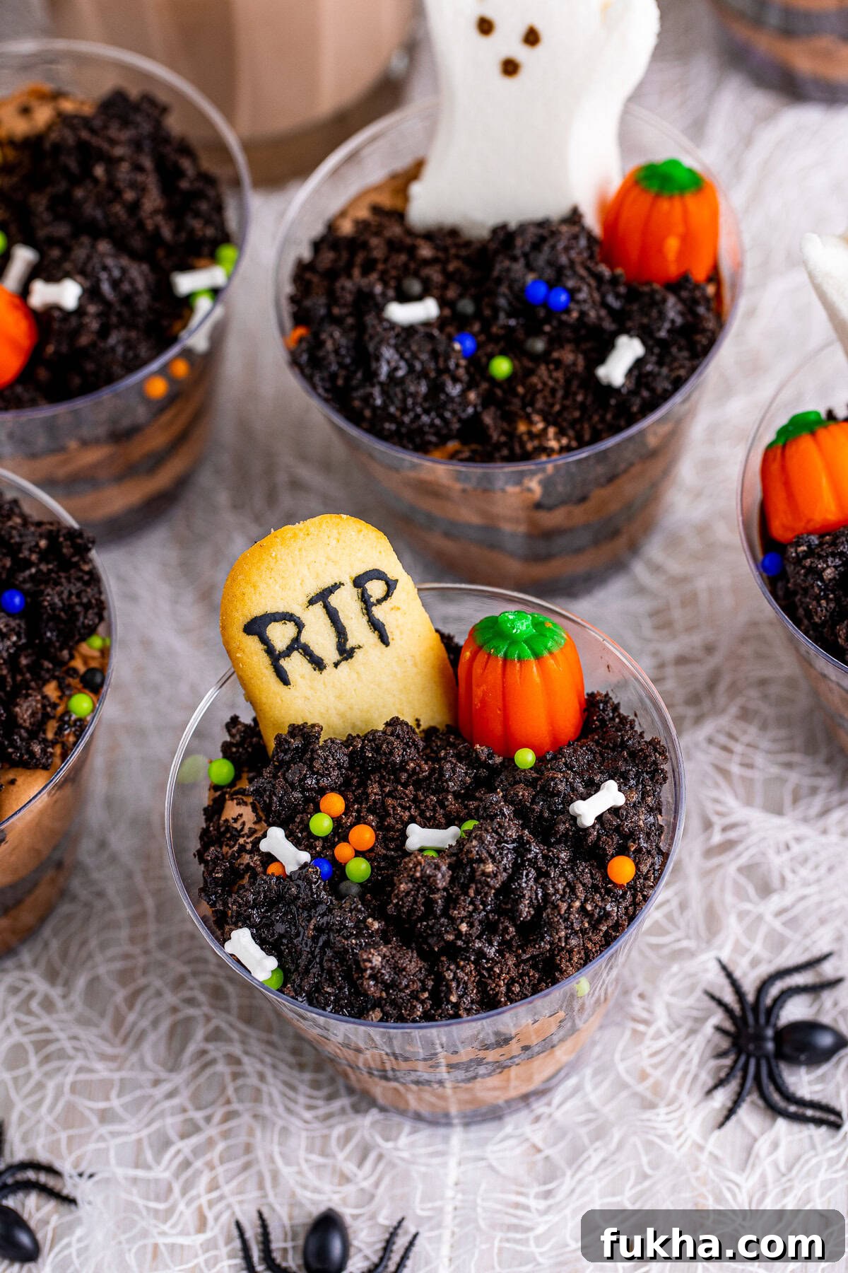 Graveyard Dirt Cups Recipe for Halloween 3 Overhead of finished Graveyard Dirt Cups.