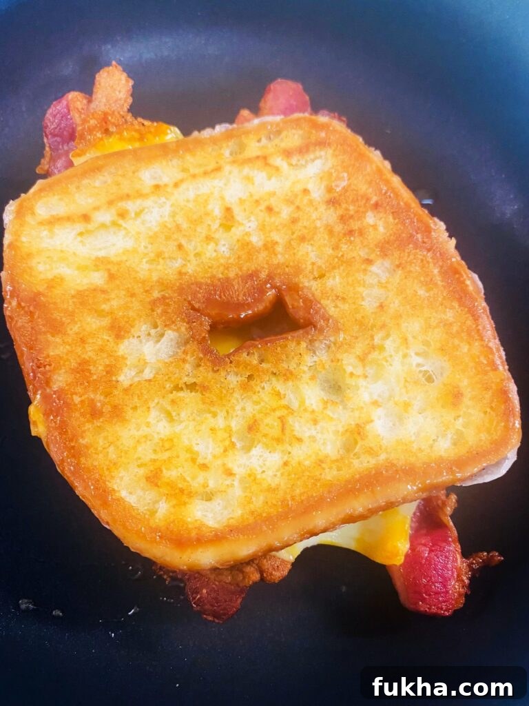 Golden brown, melty Donut Bacon Grilled Cheese