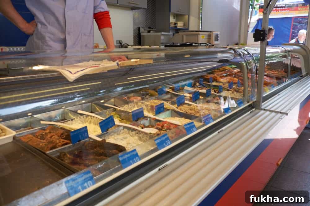 24-Hour Berlin Food Guide: What to Eat in a Day 9 Refrigerated cases full of a variety of salads and other prepared foods.