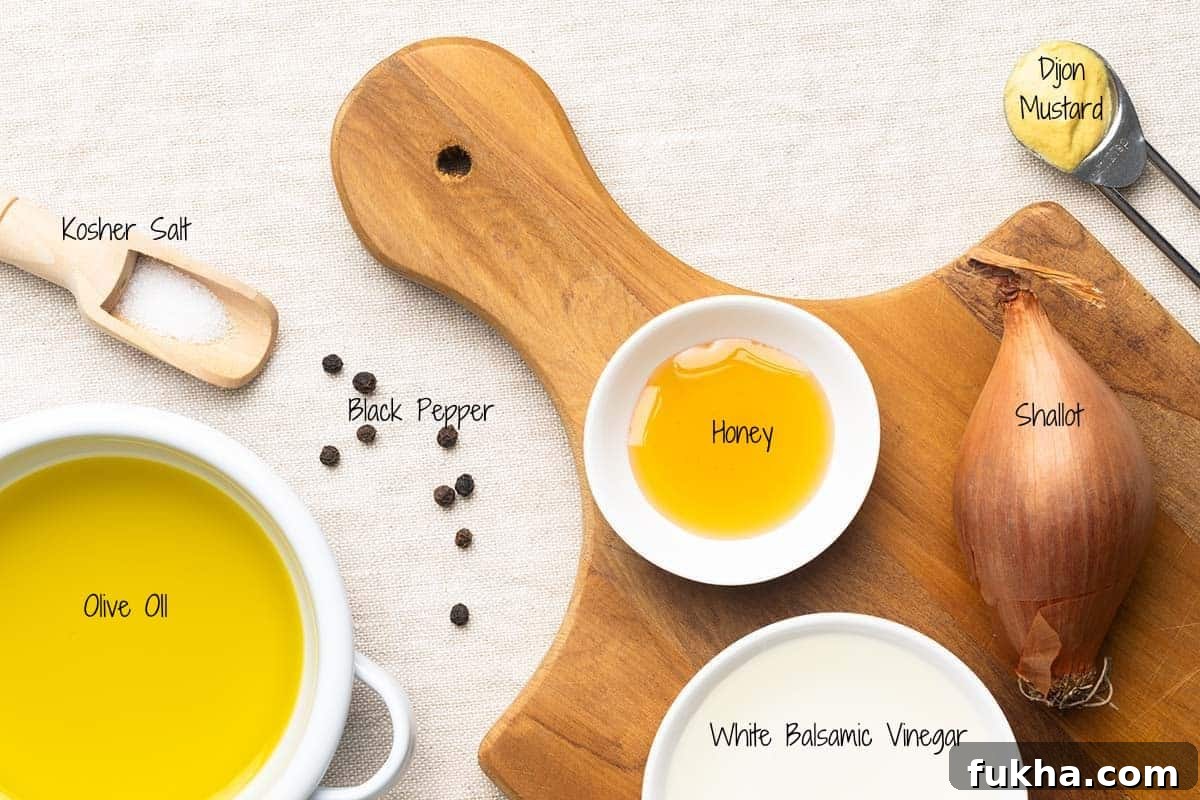 White Balsamic Vinaigrette Ingredients on a linen cloth.
