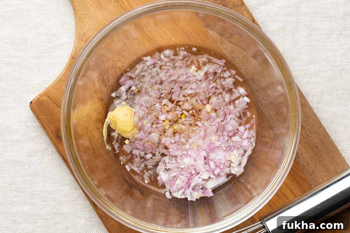 vinaigrette ingredients in a bowl.