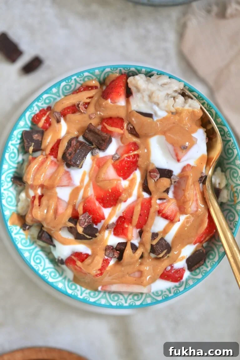 bowl of yogurt with strawberries and chocolate