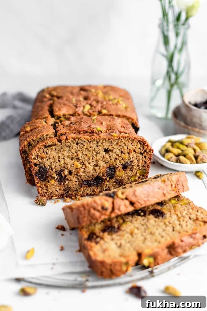 The most moist and delicious Gluten-Free Cherry Orange Pistachio Bread, lovely with a cup of tea for breakfast. Naturally sweetened and bursting with tart cherries!