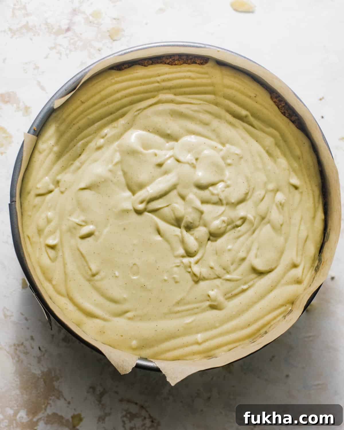 Creamy Pistachio Cheesecake Recipe 6 pistachio cheesecake batter in the springform pan.
