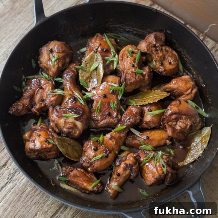 Filipino chicken adobo in a skillet.