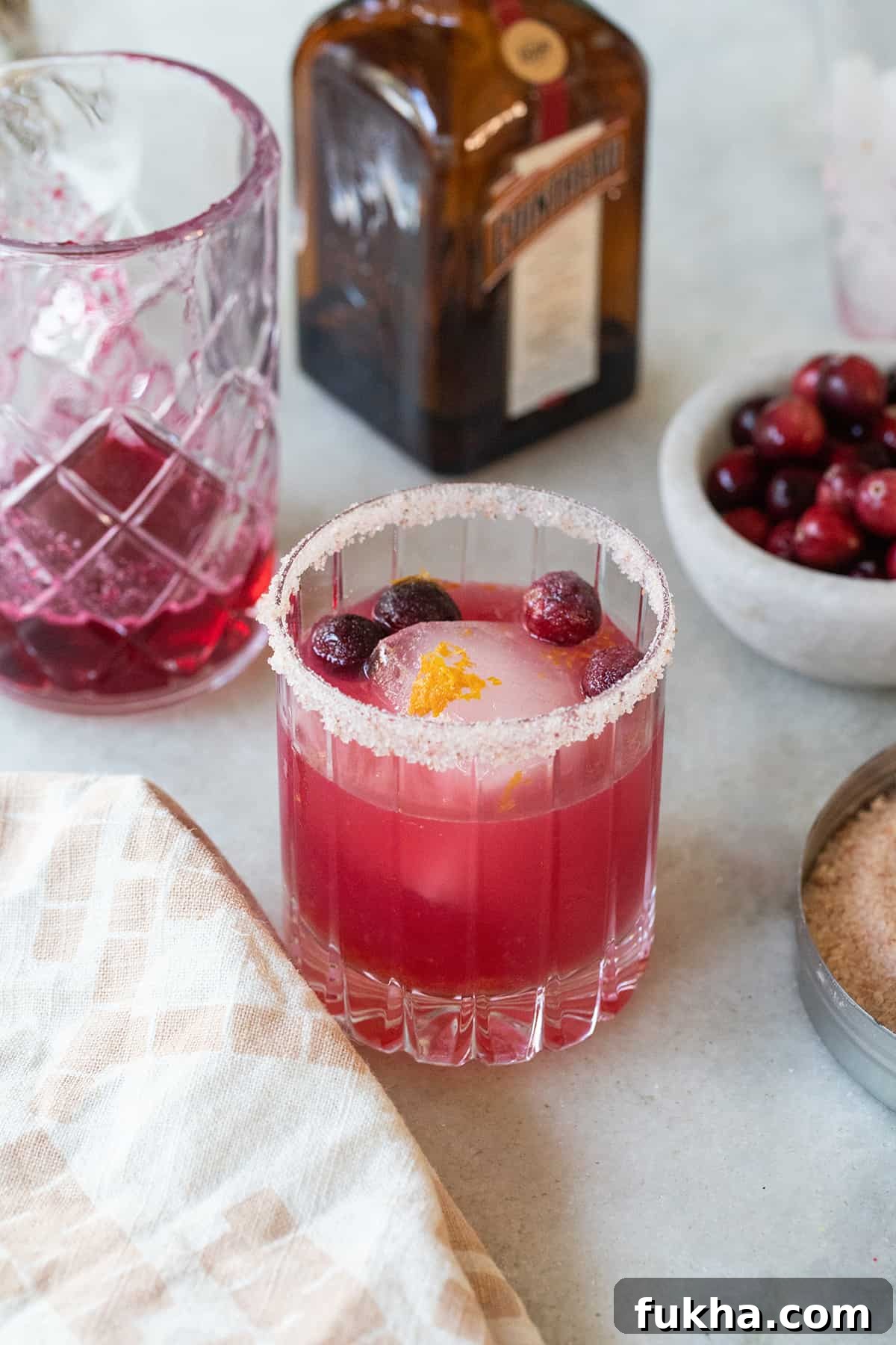 Margarita Recipes for Spring, Summer, Fall and Winter 18 Cranberry margarita with a pink vibrant color and a salted rim.