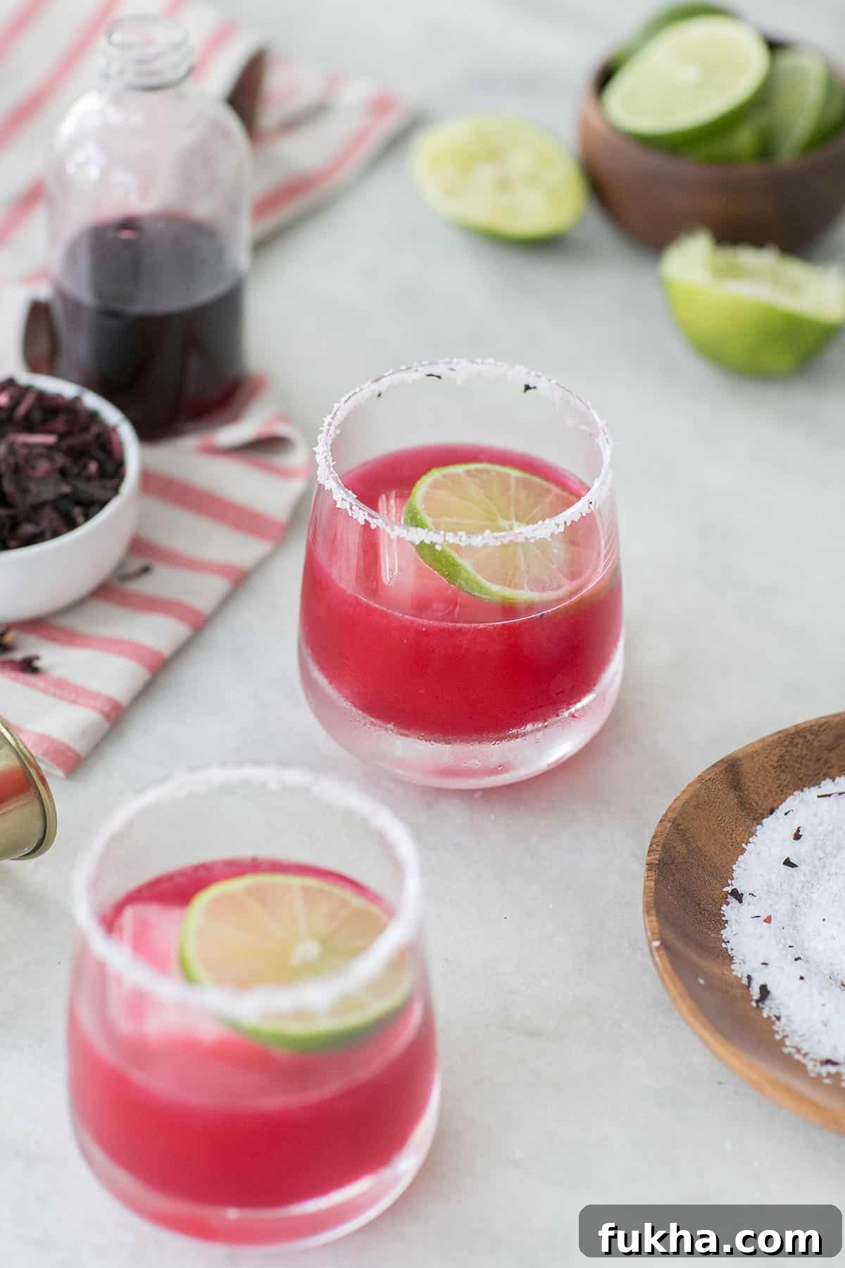 Margarita Recipes for Spring, Summer, Fall and Winter 10 Hibiscus margarita colored pink with lime.