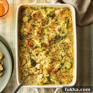 An oven dish with a one pan Chicken Kiev Pasta inside, ready to serve onto plates.
