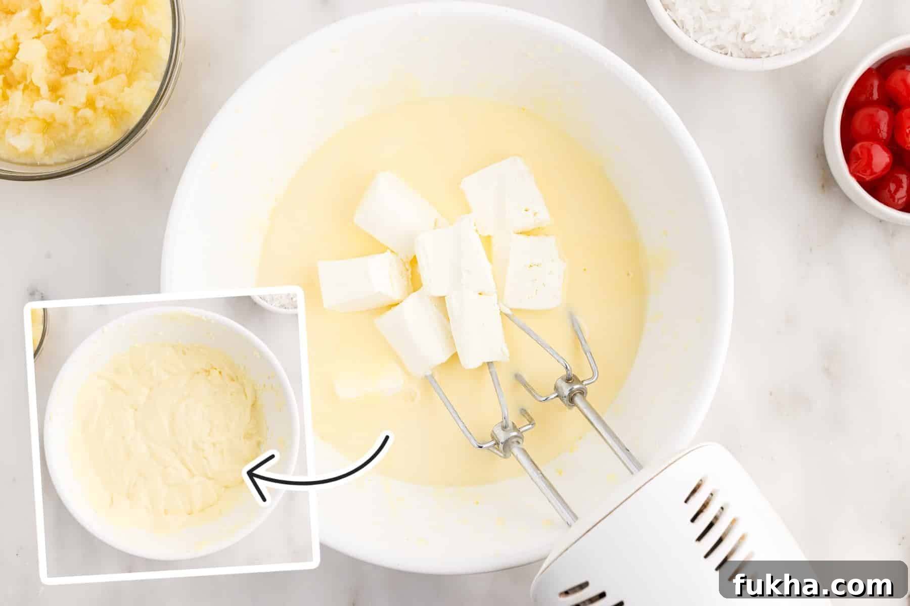 Cream cheese chunks added to the pudding mixture.