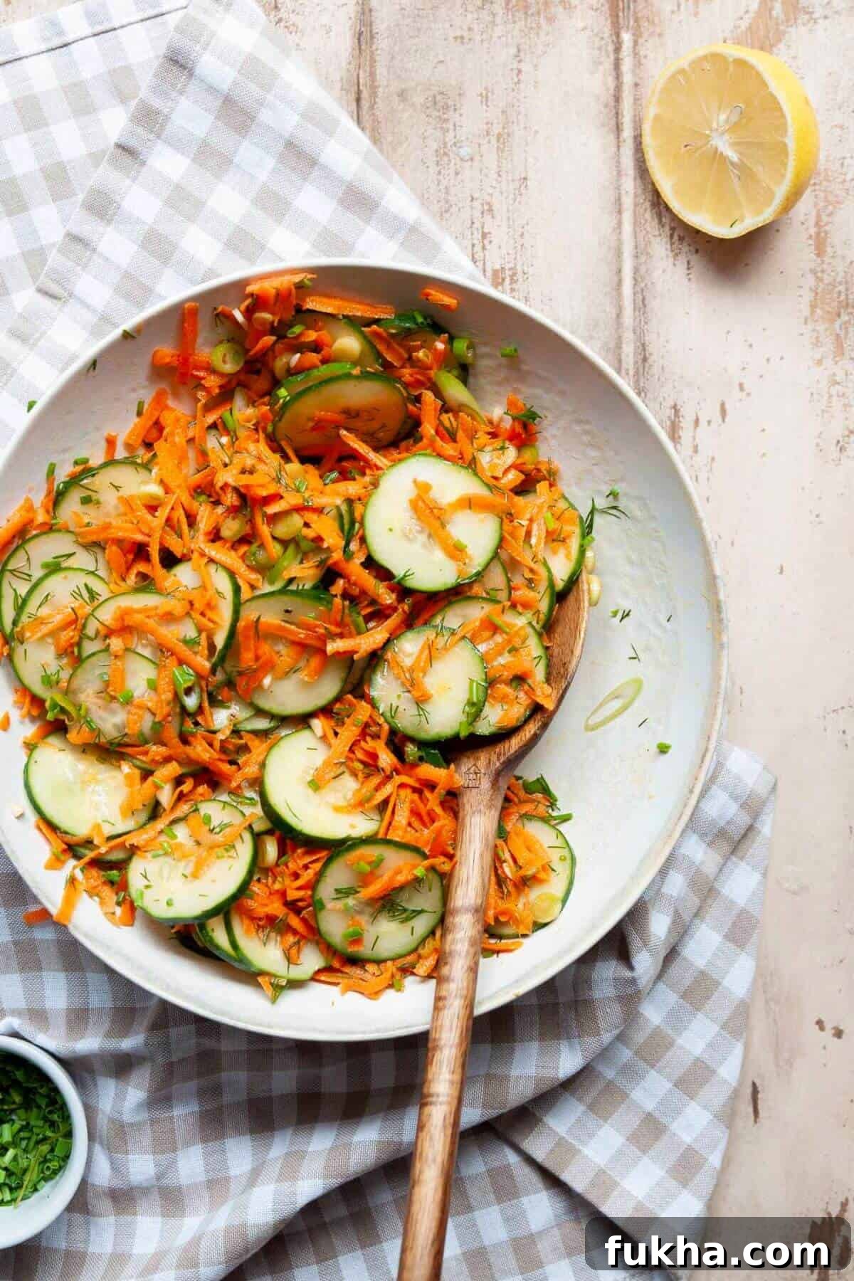 Italian cucumber carrot salad in a serving bowl.