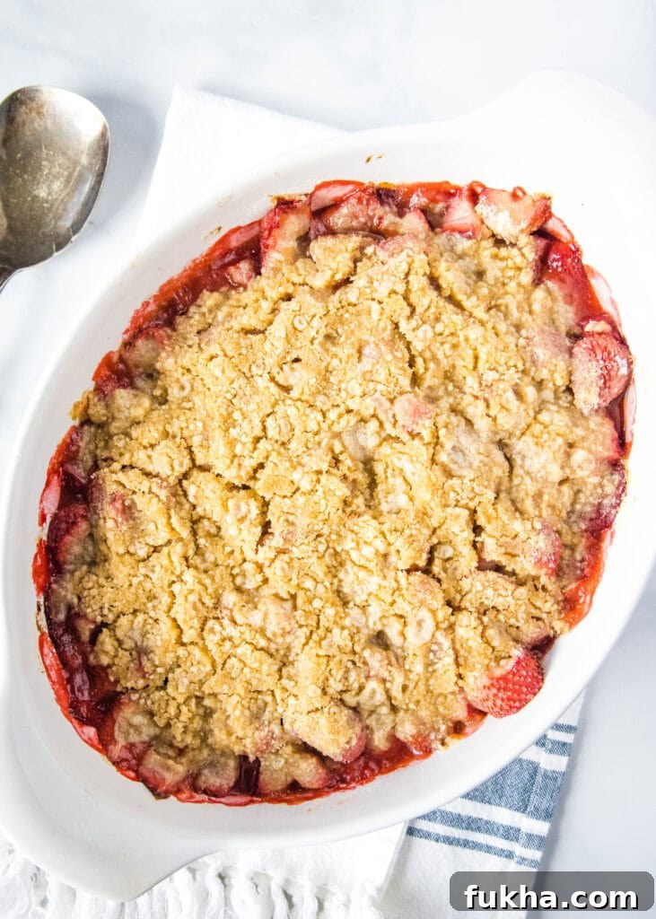 baked strawberry crumble on a towel