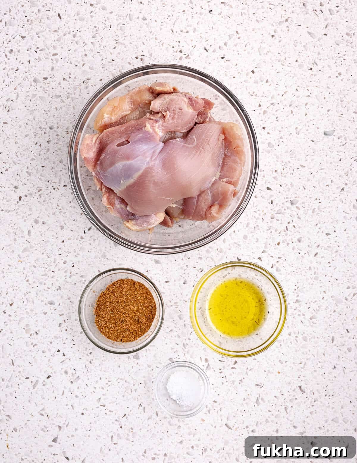 boneless skinless chicken thighs, olive oil, taco seasoning, and kosher salt. 