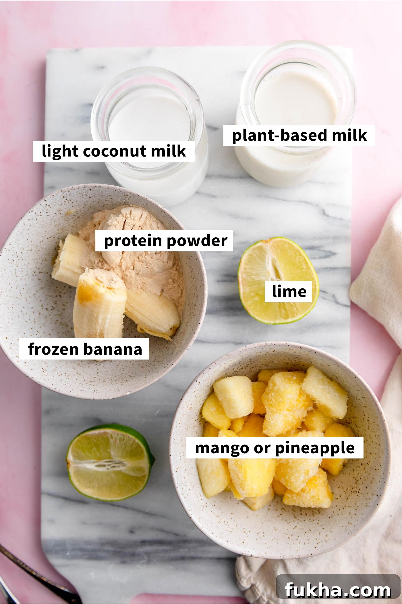 Ingredients for making a creamy coconut milk smoothie.