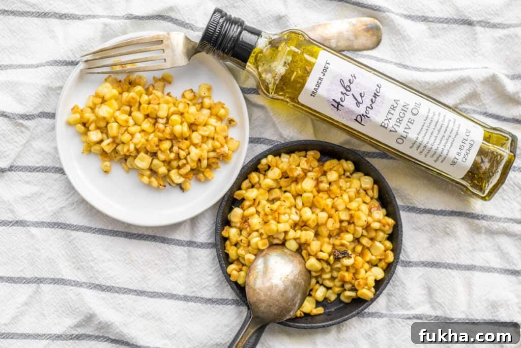 Smoky Charred Corn on the Cob Recipe 6 charred corn with olive oil and utensils