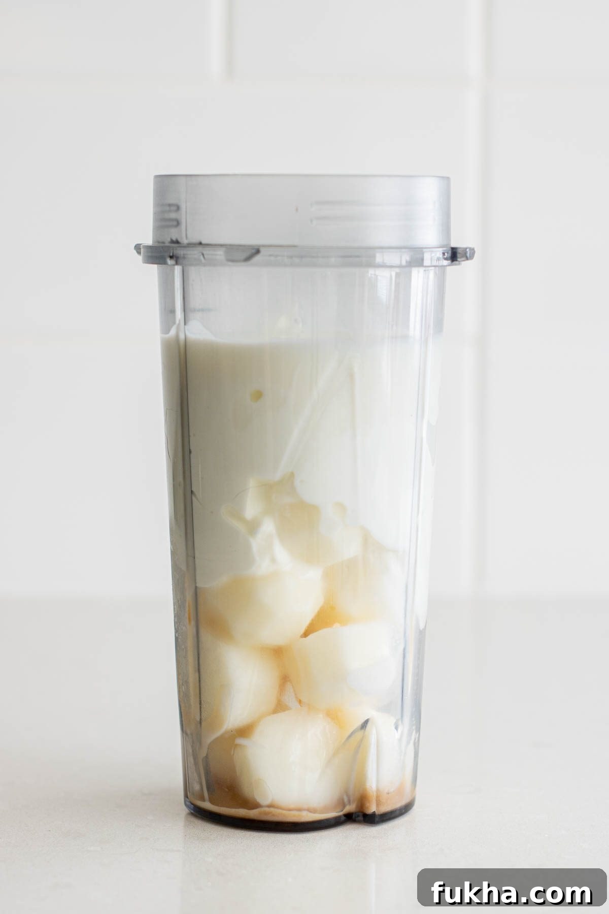 Ingredients of the frappe in a bullet blender.