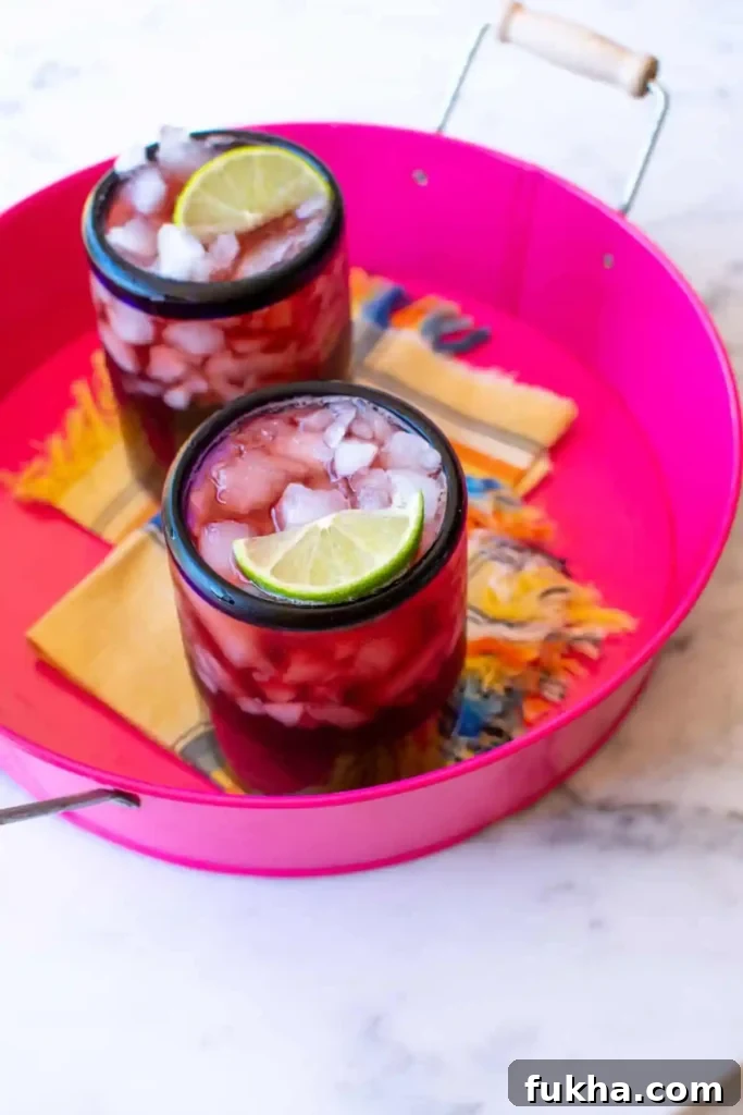 Two glasses of agua de jamaica
