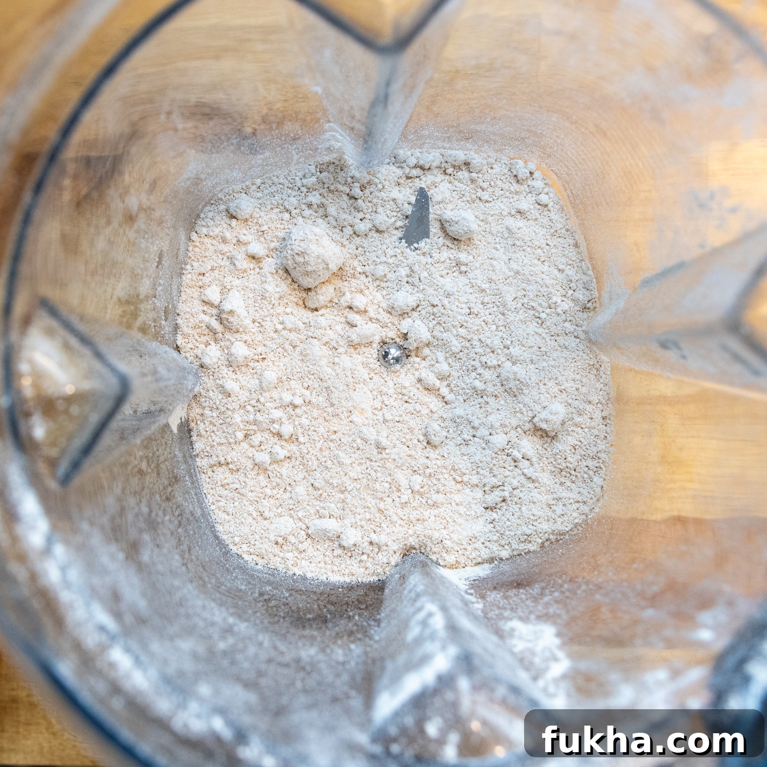 Dry tortilla ingredients in blender.