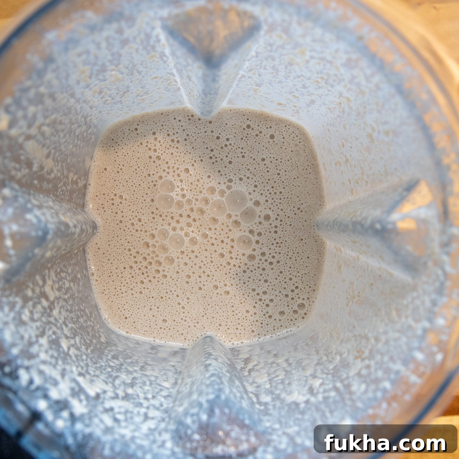 Wet tortilla ingredients in blender.