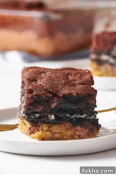 Fudgy Oreo-Stuffed Brownies Recipe 11 A slutty brownie on a plate.
