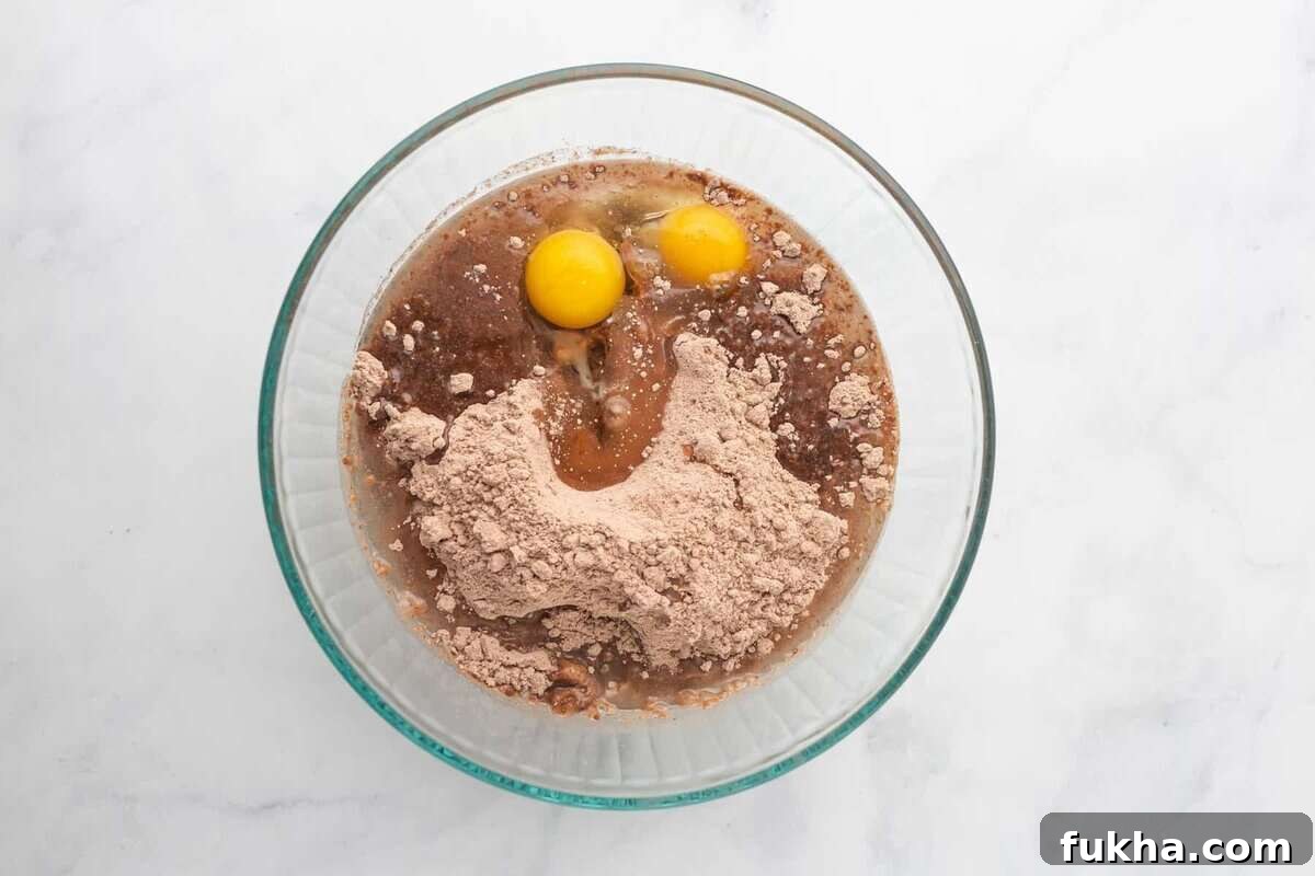 Fudgy Oreo-Stuffed Brownies Recipe 5 Ingredients for brownies in bowl.