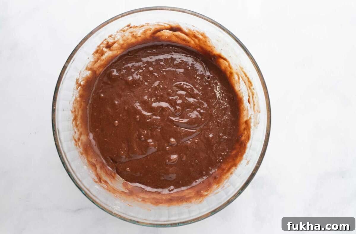 Fudgy Oreo-Stuffed Brownies Recipe 6 Brownie batter in bowl.