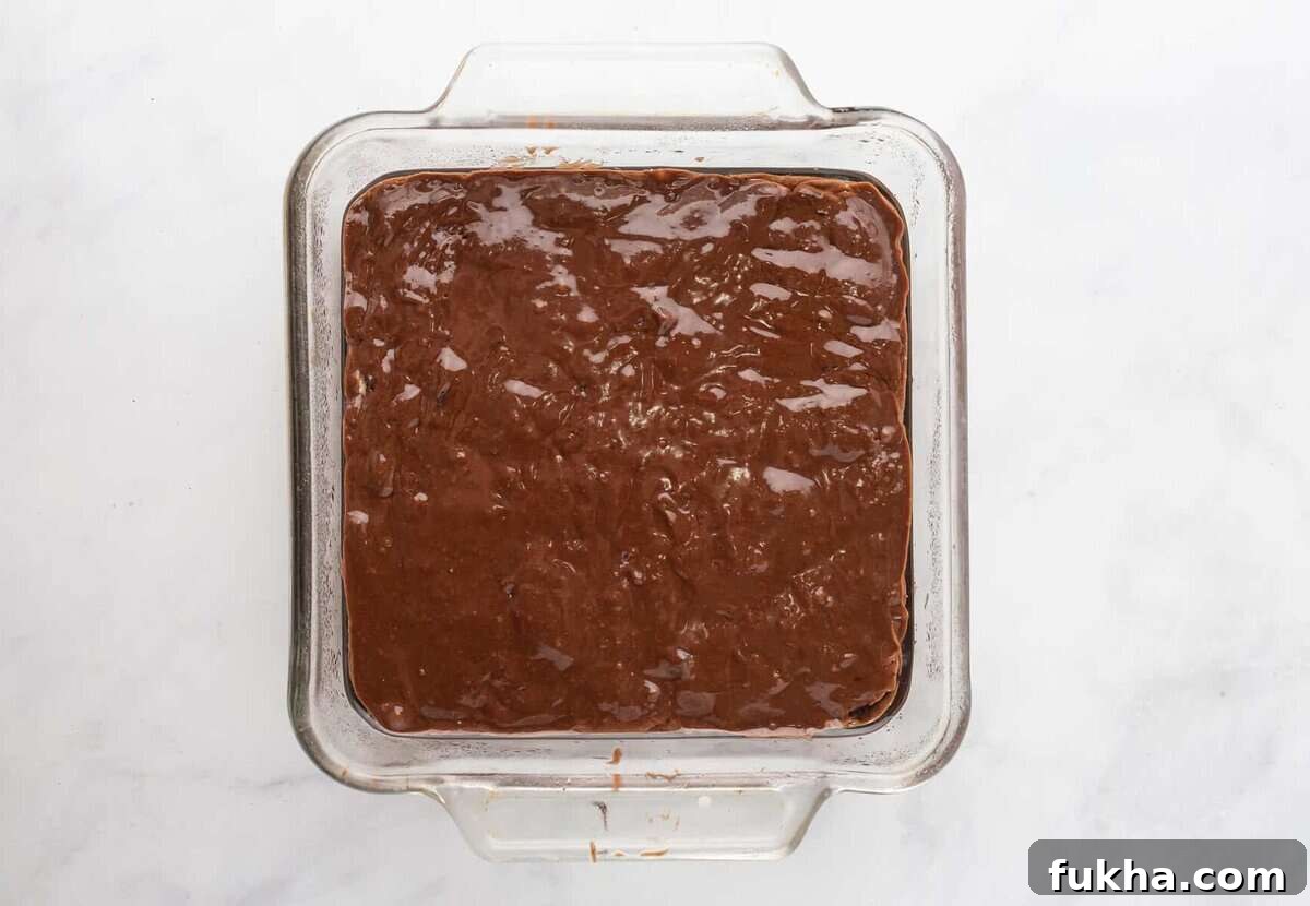 Fudgy Oreo-Stuffed Brownies Recipe 7 Brownie batter in pan.