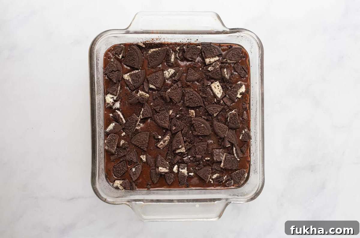 Fudgy Oreo-Stuffed Brownies Recipe 8 Oreo brownies in pan.
