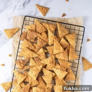 Sourdough cinnamon sugar crackers cooling on a rack
