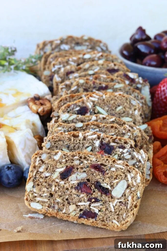 Sourdough fruit and seed crackers on a cheese platter