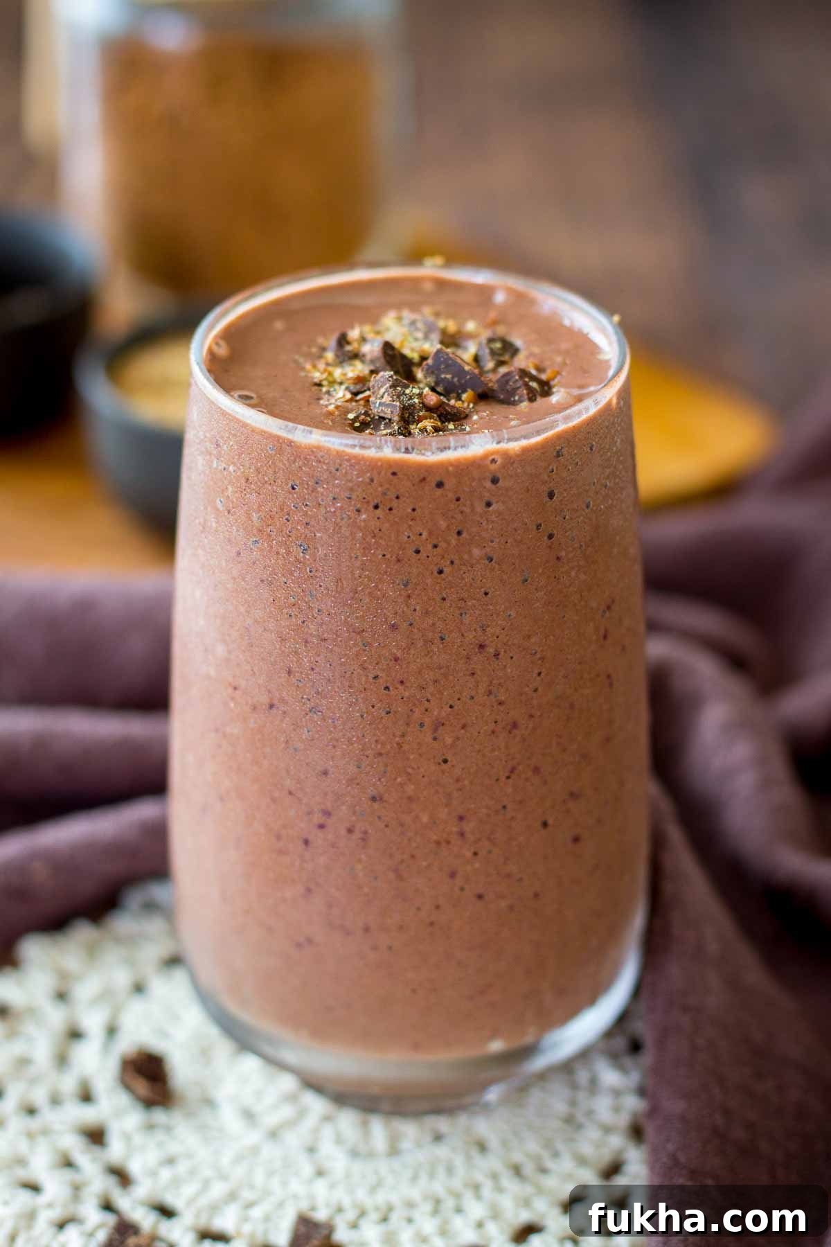 Creamy Cherry Chocolate Smoothie Recipe 2 Cherry Chocolate Smoothie served in a glass topped with dark chocolate
