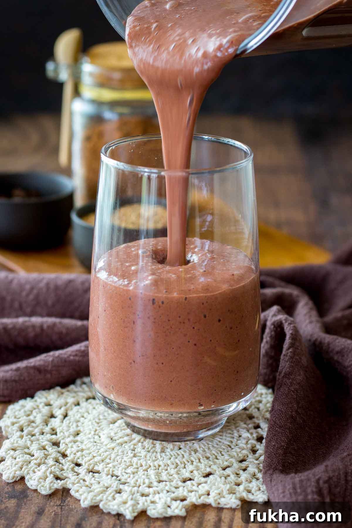 Creamy Cherry Chocolate Smoothie Recipe 4 Pouring Cherry Chocolate Smoothie in a glass