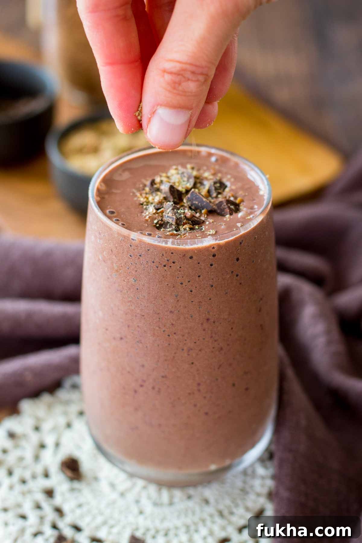 Creamy Cherry Chocolate Smoothie Recipe 6 Cherry Chocolate Smoothie served in a glass topped with dark chocolate
