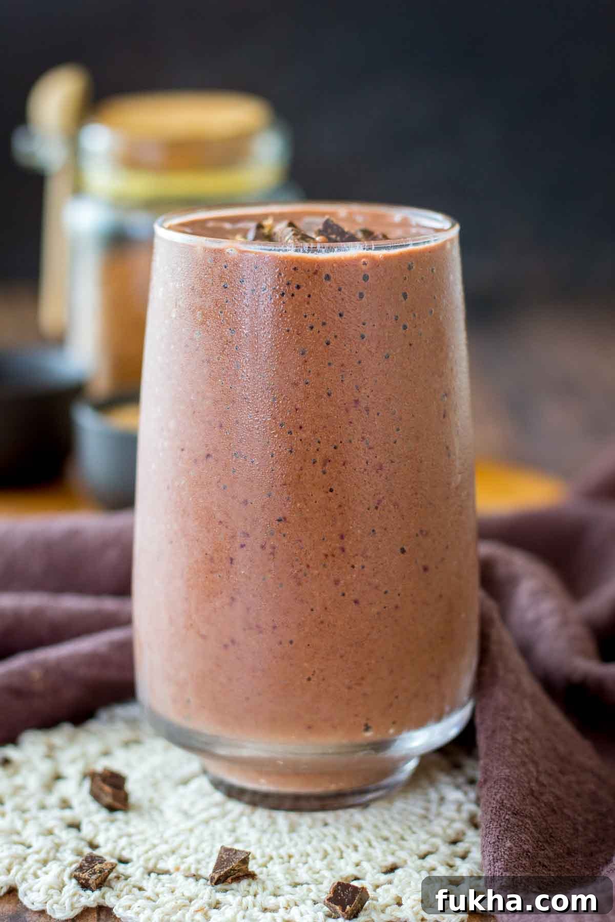Creamy Cherry Chocolate Smoothie Recipe 8 Cherry Chocolate Smoothie served in a glass topped with dark chocolate
