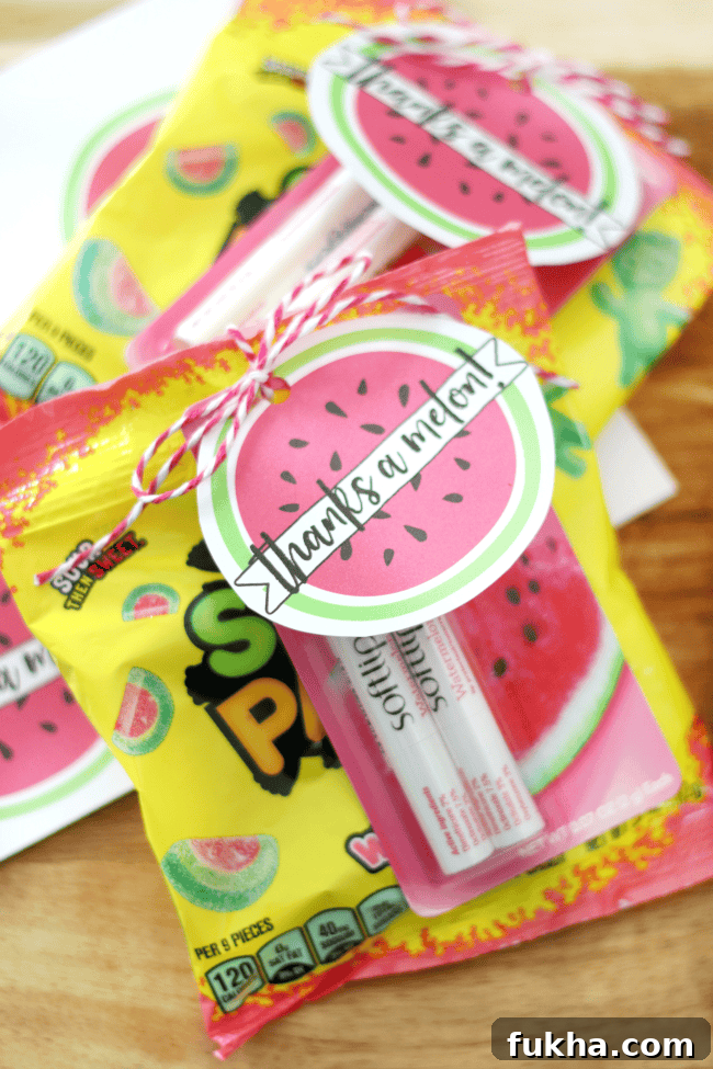 tag tied onto lip gloss and candy with ribbon