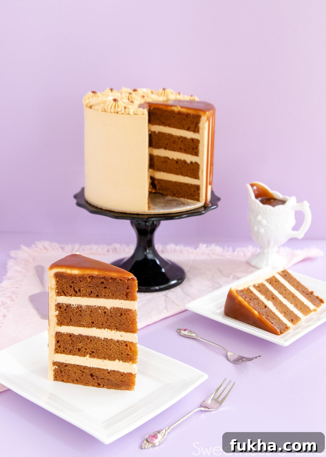 Decadent Caramel Mud Cake Recipe with Gluten Free Option 3 Slice of cake showing the layers of cake and caramel buttercream. Cake on the cake stand in the background.