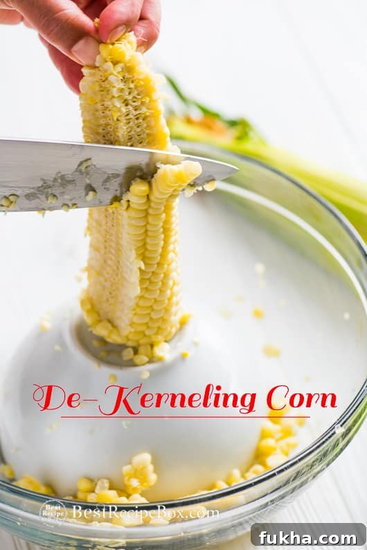 Tips for De-Kernal Corn in a glass bowl with knife 