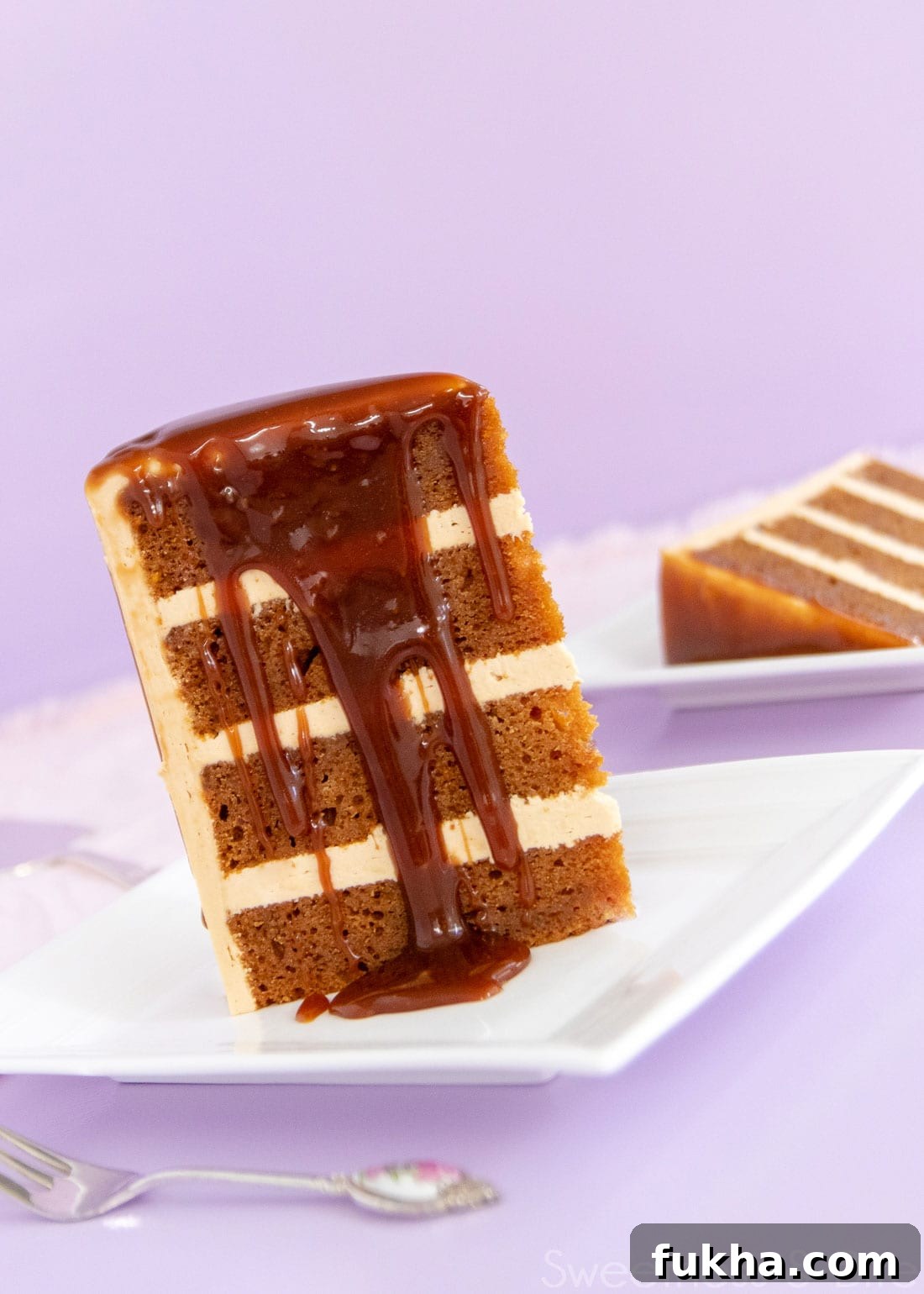 Decadent Caramel Mud Cake Recipe with Gluten Free Option 10 Slice of caramel mud cake with dripping caramel sauce.
