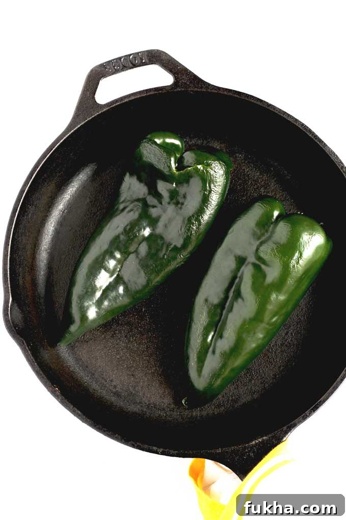 Green Poblano Peppers in a skillet