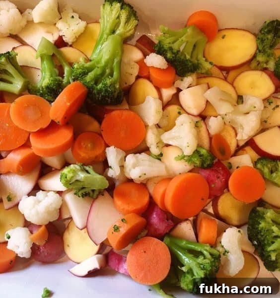 Add a layer of mixed frozen vegetables 