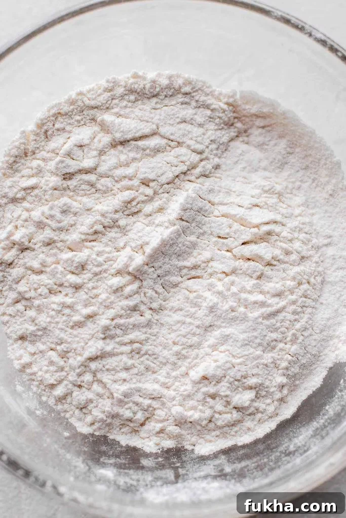 How to Make a Cake and Pastry Flour Substitute 4 sifted cake and pastry flour in bowl