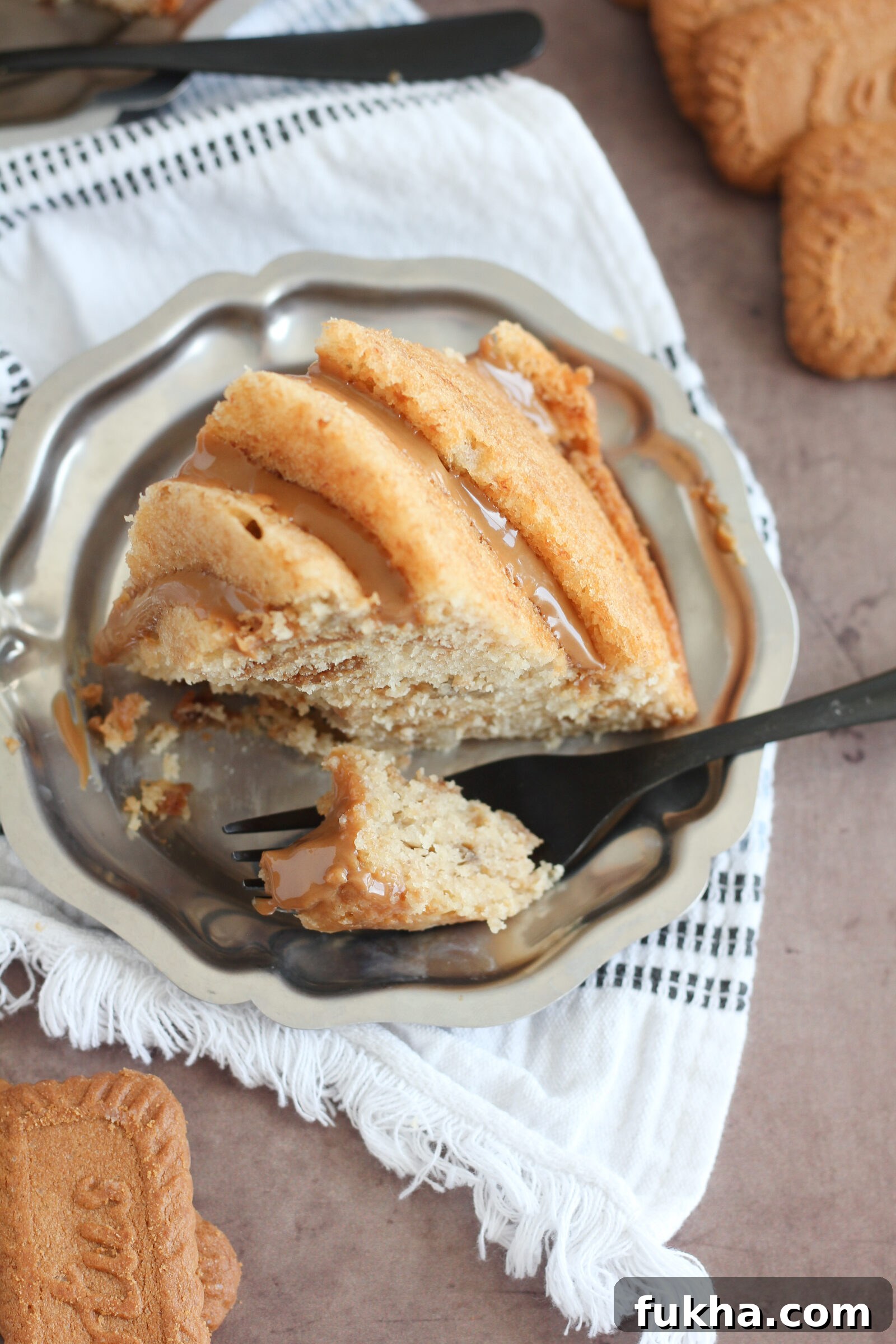 Banana Biscoff Bundt Cake with Cookie Butter Glaze 11 Banana Biscoff Bundt Cake on stand